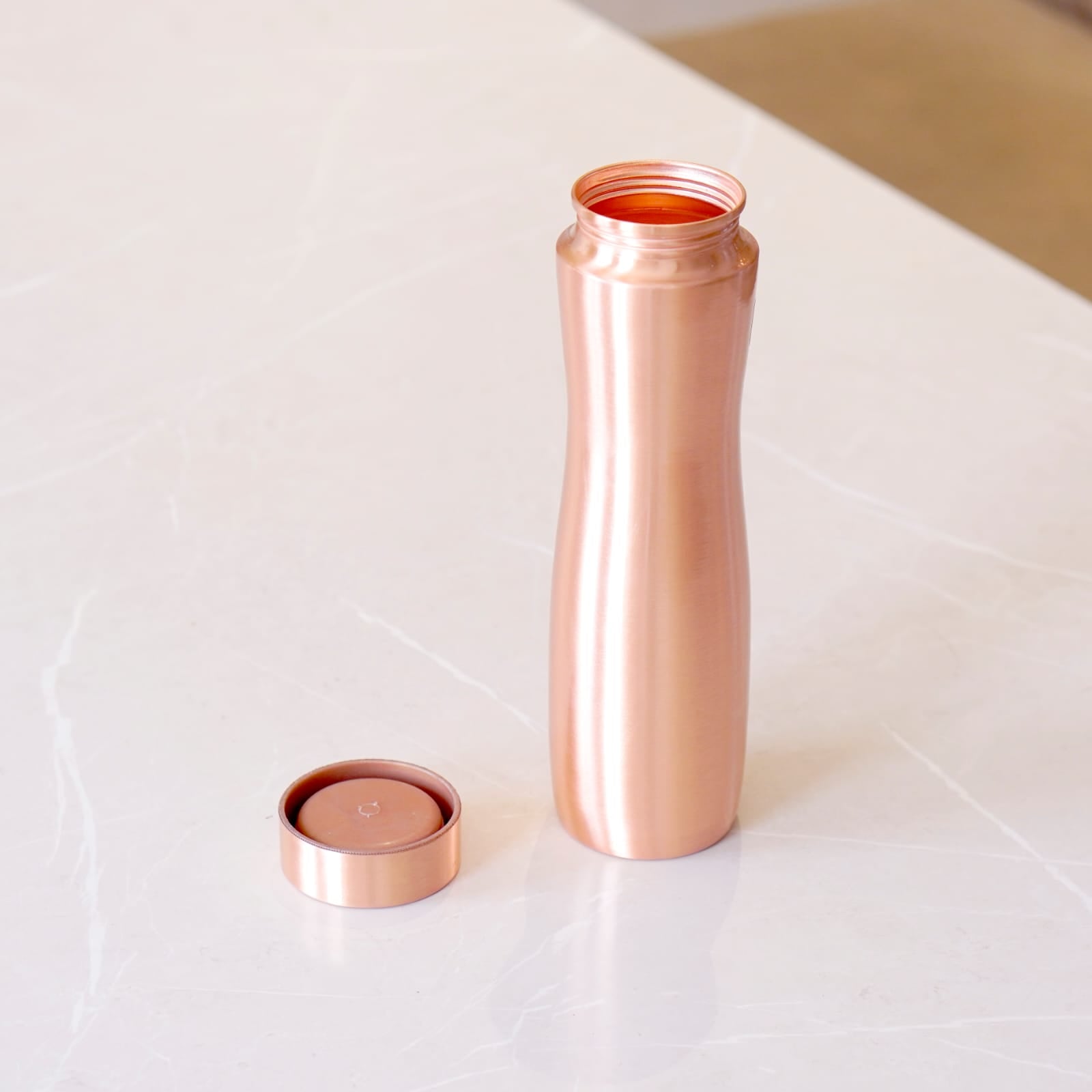 Curved Copper Bottle