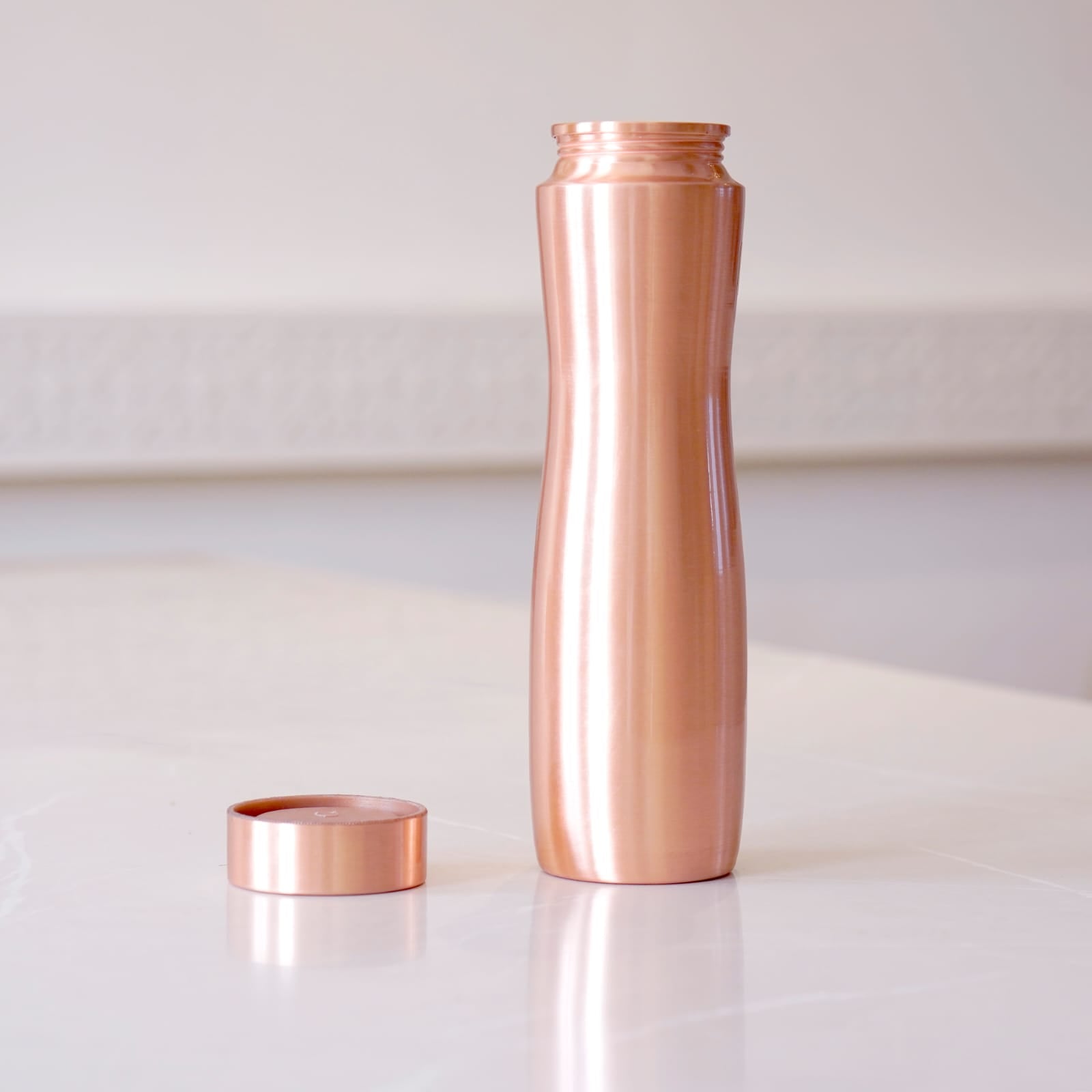 Curved Copper Bottle