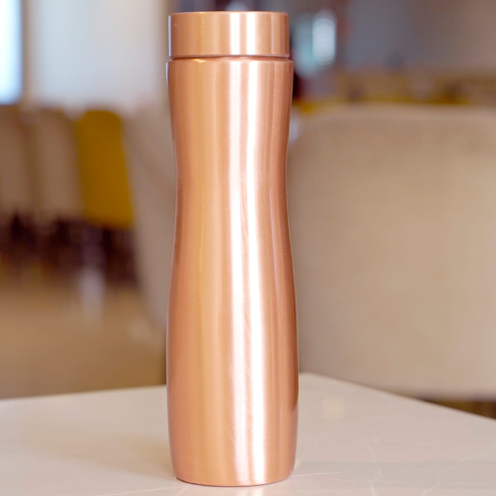 Curved Copper Bottle