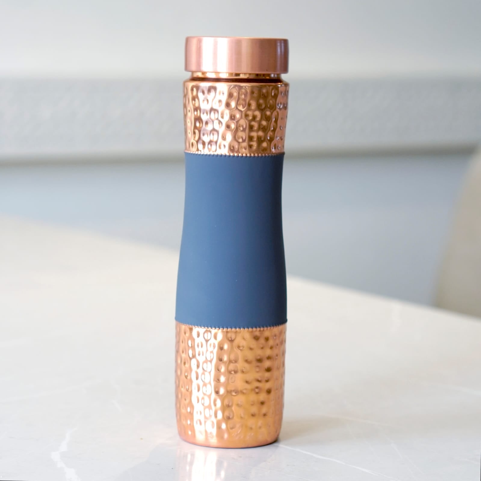 Curved Copper Bottle