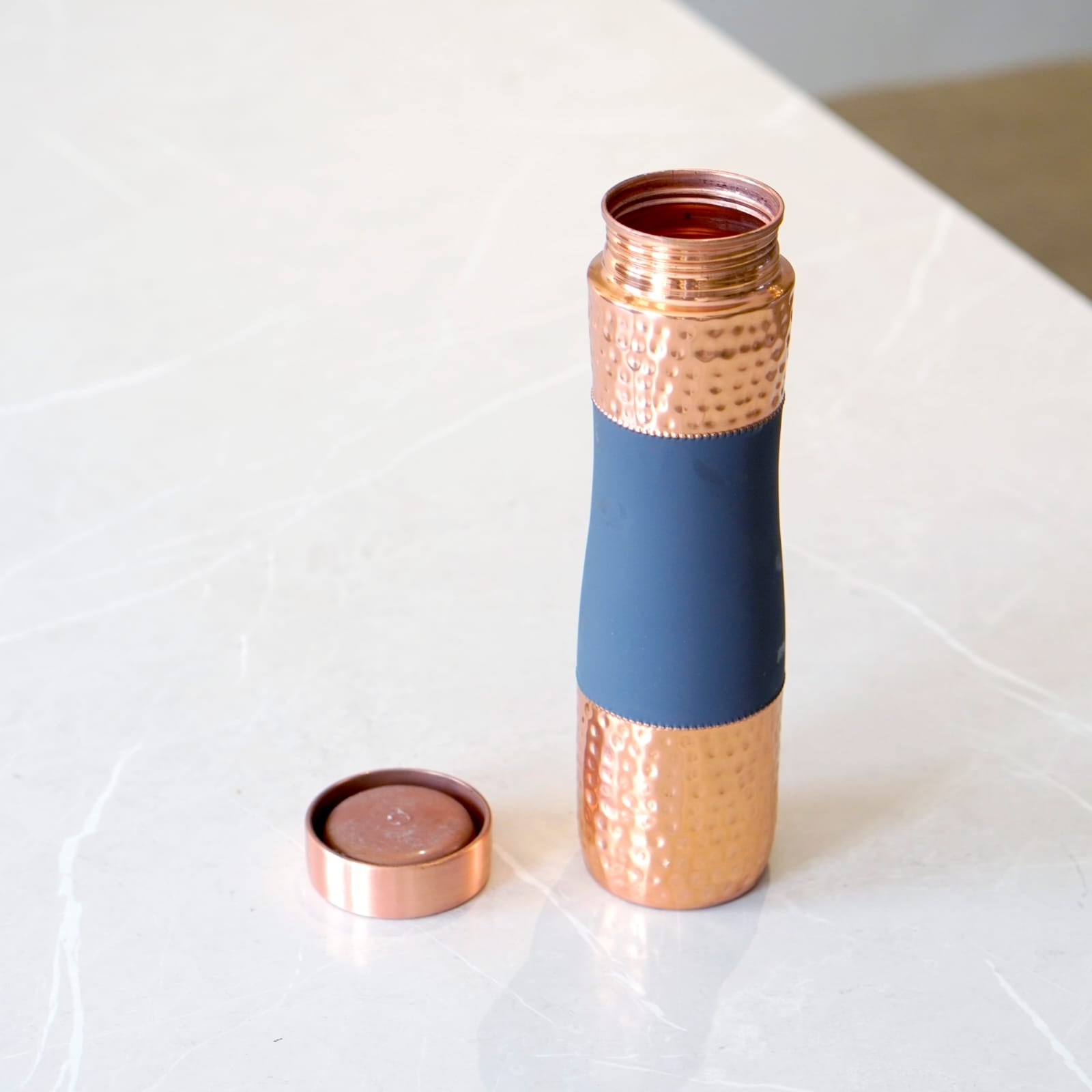 Curved Copper Bottle