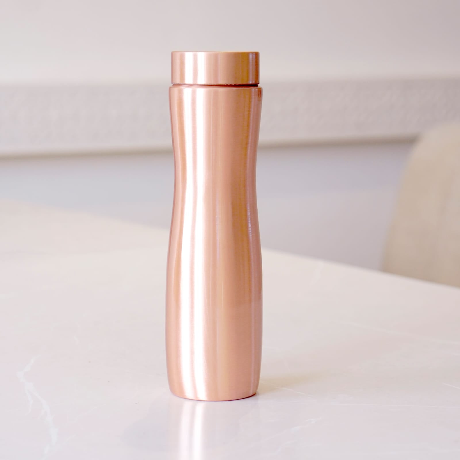 Curved Copper Bottle